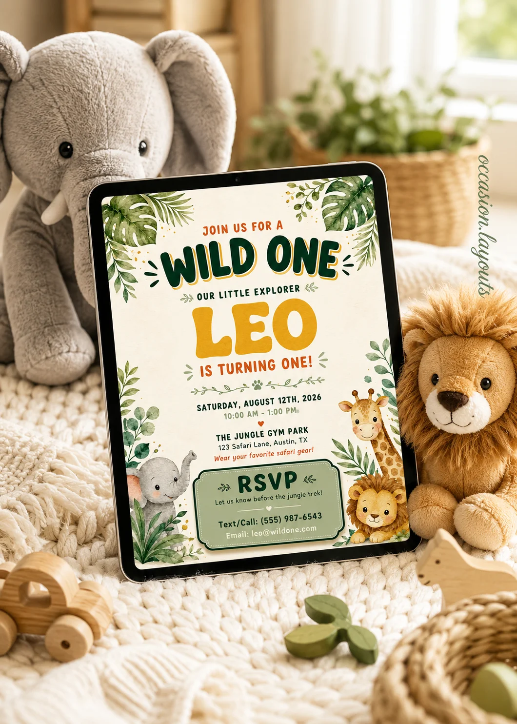 Kids jungle safari birthday invitation with watercolor leaves, cute safari animals, and a playful Wild One theme in a cozy nursery mockup.